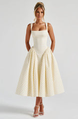 https://cdn.shopify.com/s/files/1/0761/6908/5184/files/sherrie-midi-dress-lemon-gingham-dress-xs-babyboo-fashion-32998616105023_600x_ac4b2f1a-d7c0-48a6-89bd-0c3585aac139.webp?v=1747068004